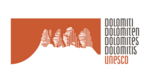 Stilisiertes Logo der Dolomiten mit UNESCO-Schriftzug