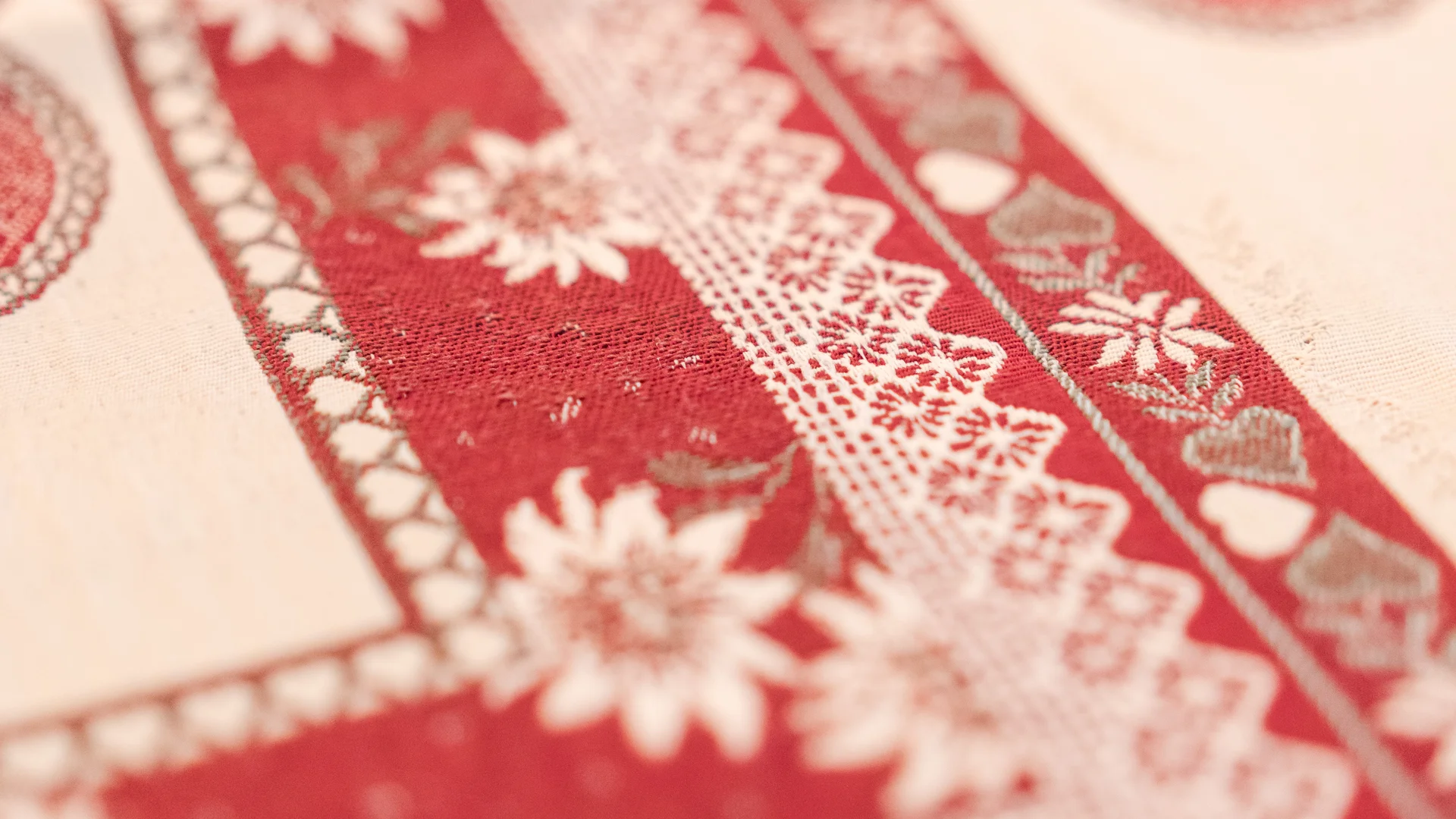 Red and white fabric with floral and heart patterns